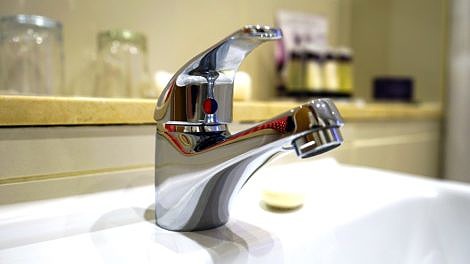 Chrome bathroom water faucet