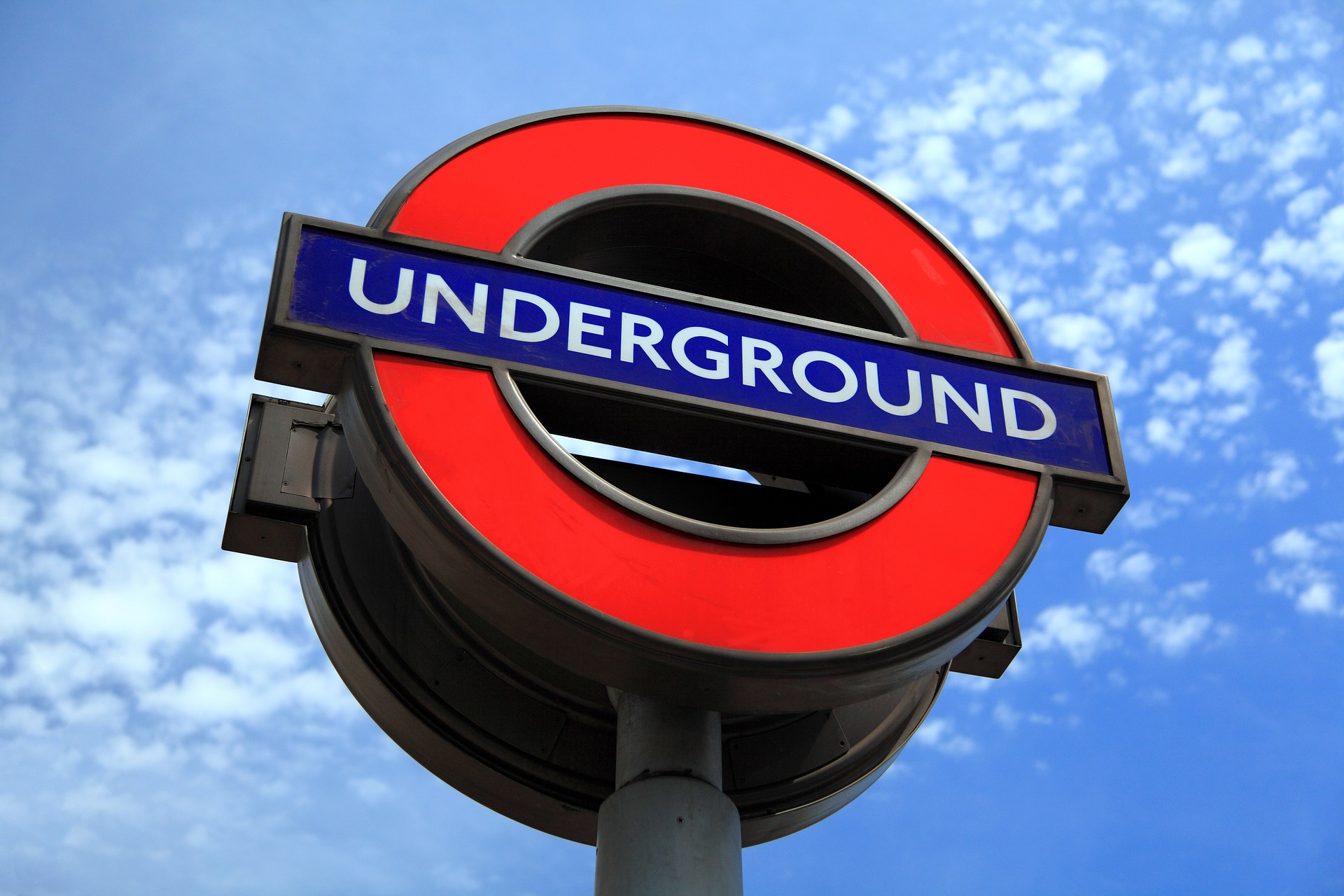 London Underground Sign against the Sky